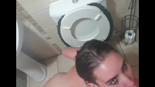 Human toilet teen sucking and licking piss covered dildo in toilet