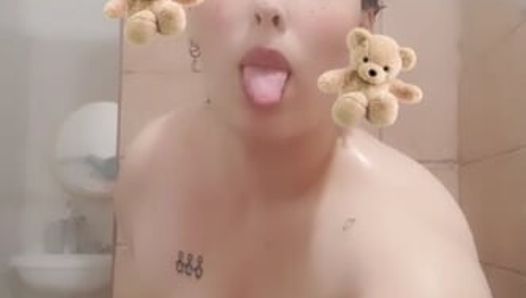 A chubby girl bathing in this cold